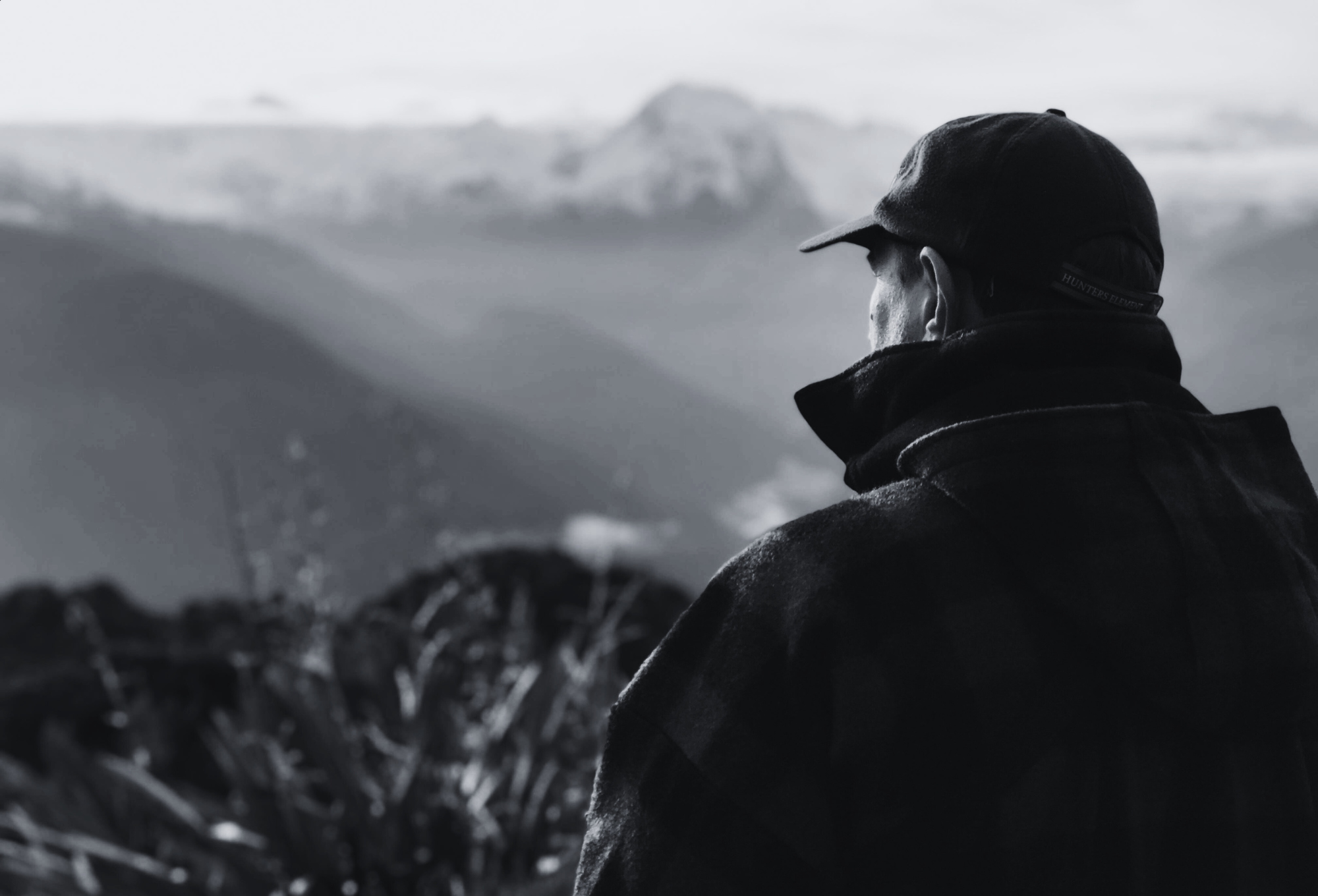 Trained wildlife ranger surveying deer habitat in the UK, part of Grey Ghost Venison’s ethical and sustainable harvesting process